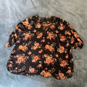 Orange flower, black blouse